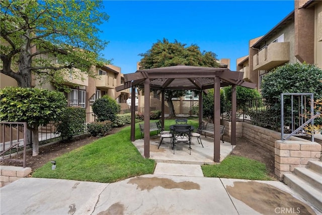 exterior space with a patio area, a gazebo, and a fenced backyard