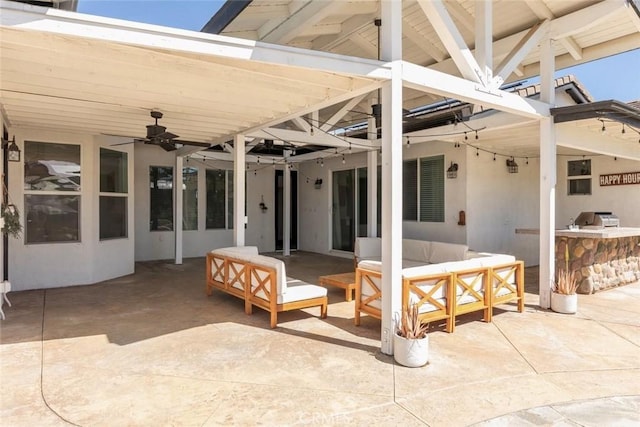 view of patio / terrace with an outdoor kitchen and an outdoor hangout area