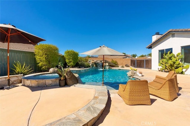 view of swimming pool featuring a patio, a fenced backyard, and a fenced in pool