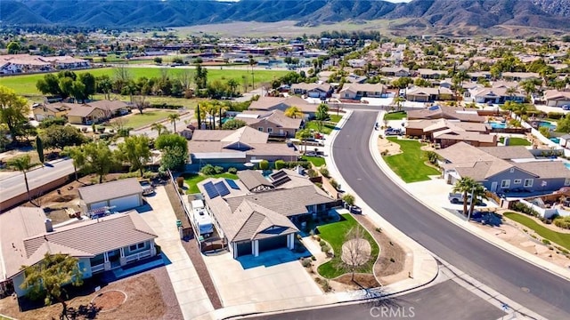 birds eye view of property with a residential view and a mountain view