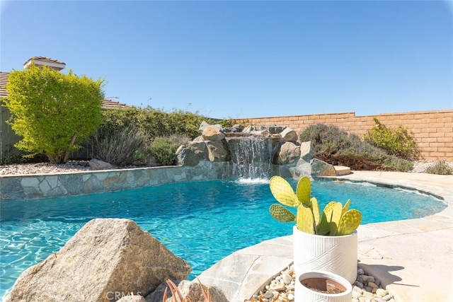 view of pool featuring a fenced backyard and a fenced in pool