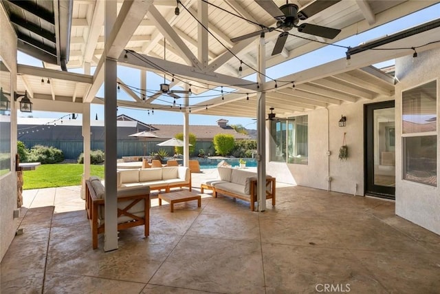 view of patio / terrace featuring a fenced in pool, an outdoor hangout area, a ceiling fan, and fence