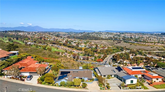 drone / aerial view featuring a mountain view and a residential view