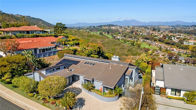 aerial view with a mountain view and a residential view