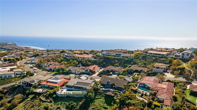 aerial view with a residential view and a water view