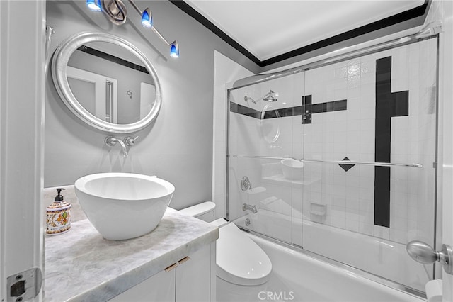 32252 Azores Rd, Dana Point, CA 92629 - bathroom with toilet, ornamental molding, bath / shower combo with glass door, and vanity