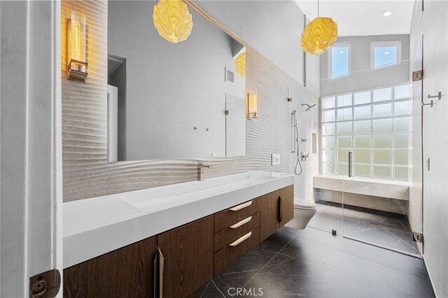 full bath featuring visible vents, walk in shower, toilet, marble finish floor, and vanity