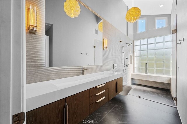 32252 Azores Rd, Dana Point, CA 92629 - bathroom featuring vanity, visible vents, marble finish floor, toilet, and a walk in shower