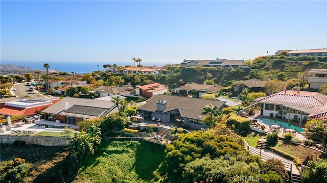 birds eye view of property featuring a residential view and a water view