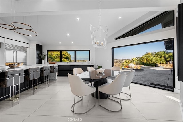 32252 Azores Rd, Dana Point, CA 92629 - dining area with light tile patterned floors, lofted ceiling, recessed lighting, and a notable chandelier