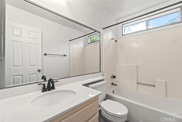 full bathroom with toilet, vanity, and shower / bathing tub combination