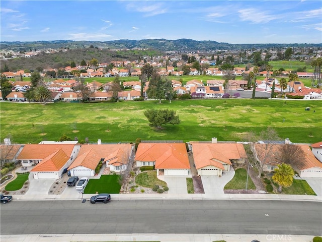aerial view featuring a residential view and a mountain view