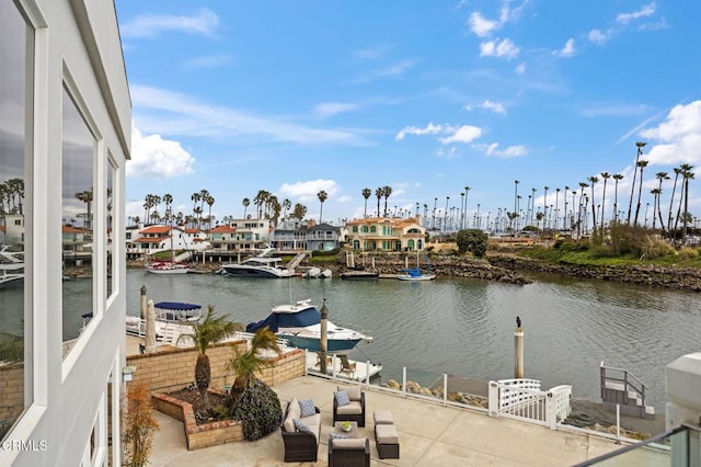 view of water feature with a dock