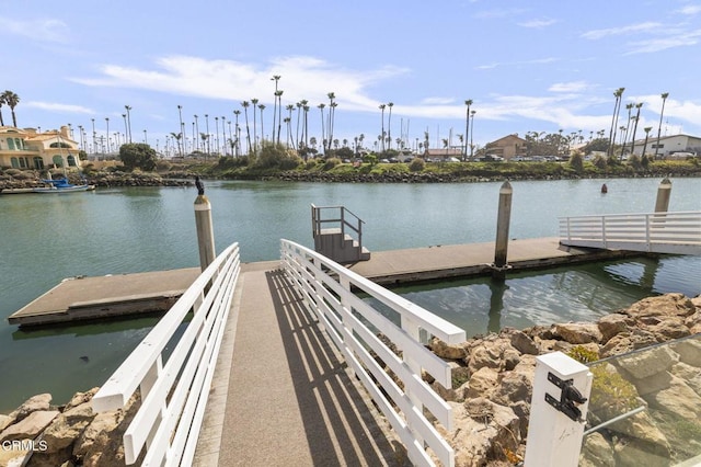 dock area featuring a water view