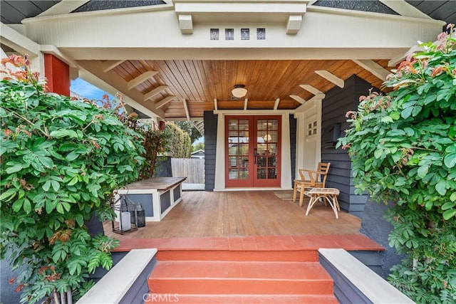 wooden deck featuring french doors