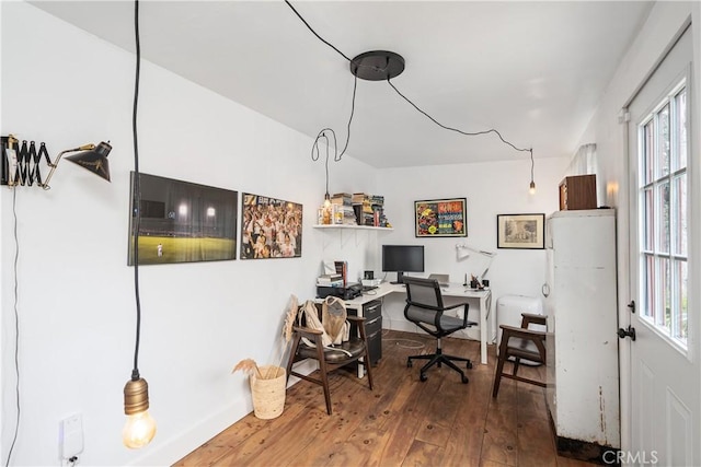 office with plenty of natural light and hardwood / wood-style floors