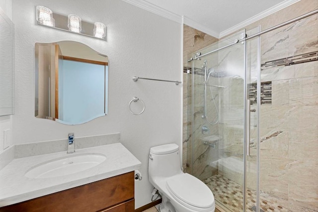 full bath featuring toilet, vanity, a shower stall, and ornamental molding