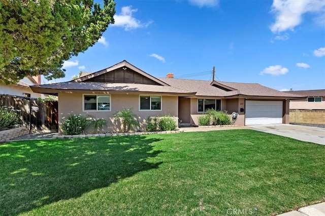 ranch-style home featuring a front yard, an attached garage, fence, and stucco siding