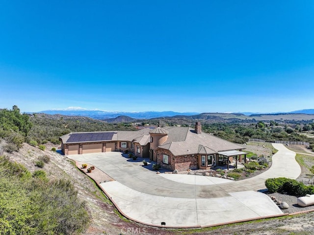 aerial view featuring a mountain view