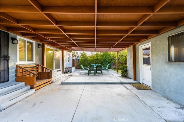 view of patio with outdoor dining area