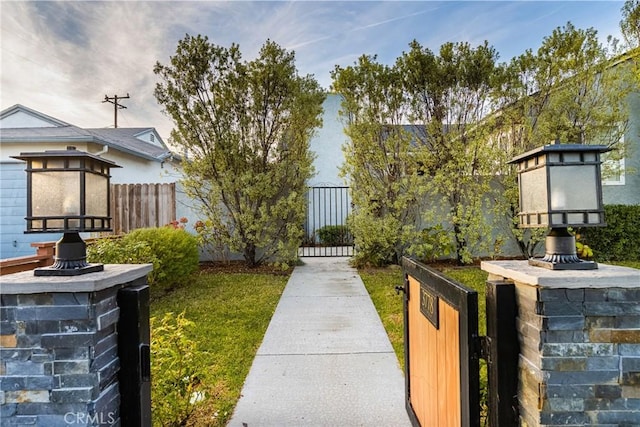 surrounding community featuring fence and a gate