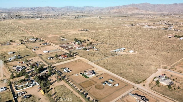 aerial view with a rural view, a mountain view, and a desert view