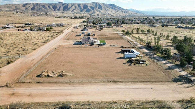 bird's eye view with a rural view and a mountain view