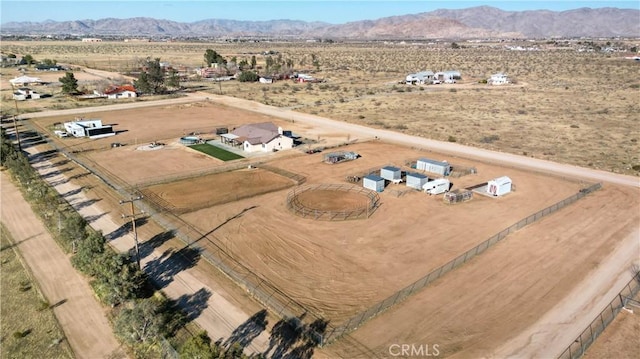 bird's eye view with a mountain view, a desert view, and a rural view