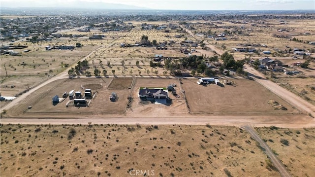 drone / aerial view with a rural view and a desert view