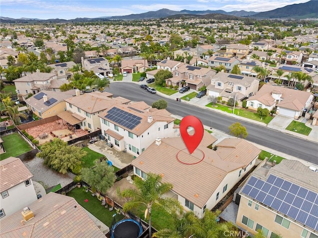 aerial view featuring a mountain view and a residential view