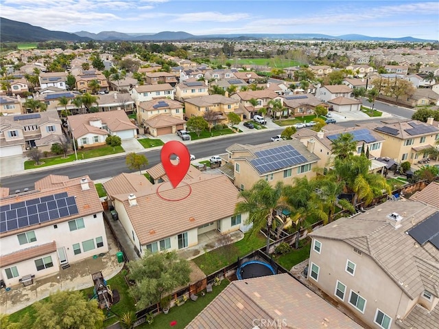 aerial view with a mountain view and a residential view