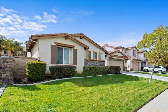 view of front facade featuring a front yard, concrete driveway, a tile roof, and stucco siding