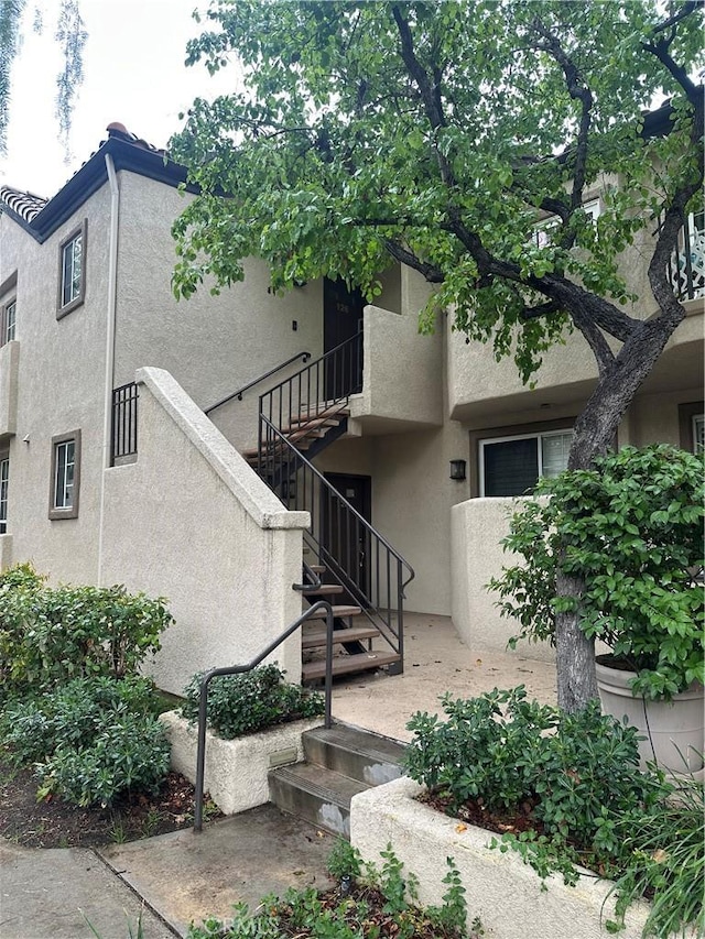 view of building exterior with stairway