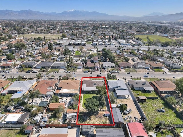 aerial view with a mountain view and a residential view