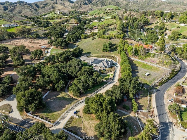 drone / aerial view featuring a mountain view