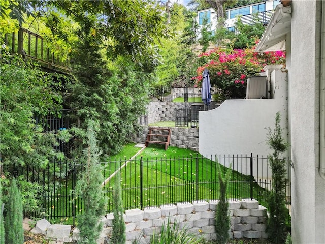 exterior space featuring stairway and fence