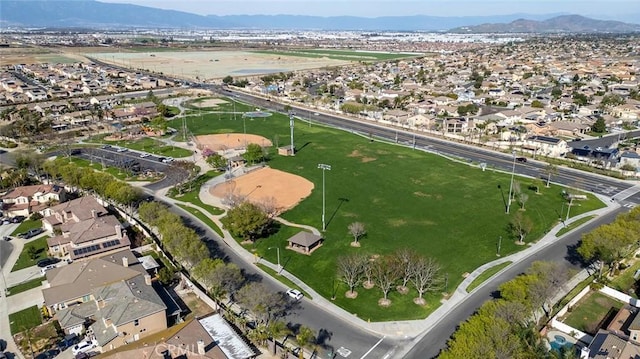 aerial view featuring a mountain view and a residential view