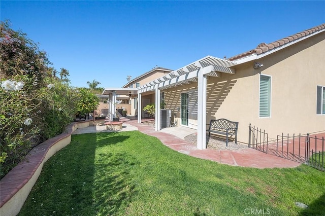 view of yard with a patio, fence, and a pergola