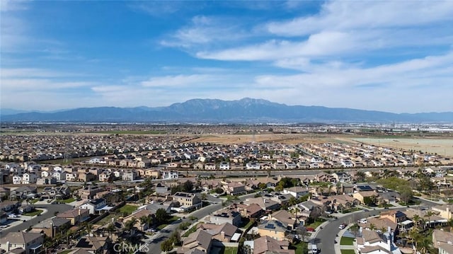 drone / aerial view with a mountain view and a residential view