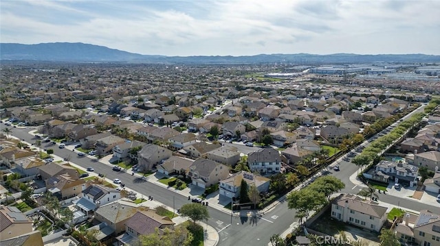 aerial view featuring a residential view and a mountain view