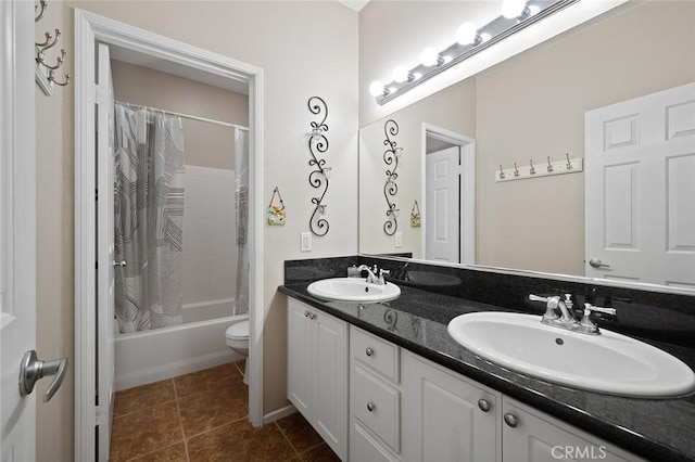 full bath with double vanity, shower / tub combo, tile patterned floors, and a sink