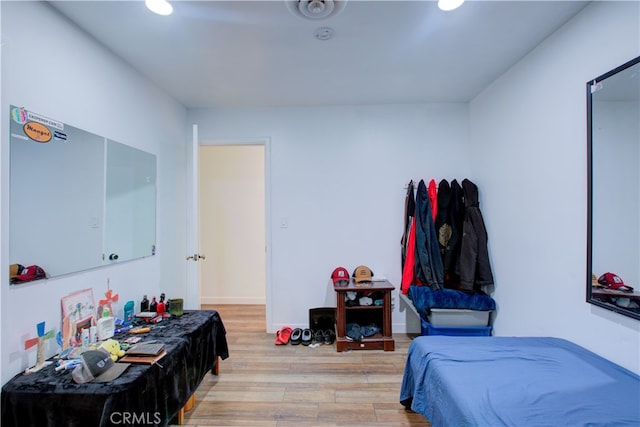 bedroom featuring light wood-style floors