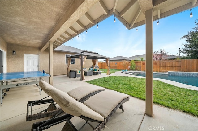 view of patio featuring a fenced in pool, an outdoor hangout area, and a fenced backyard