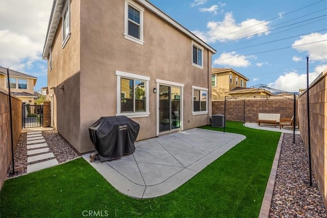 back of property featuring a patio area, central AC unit, stucco siding, and a fenced backyard