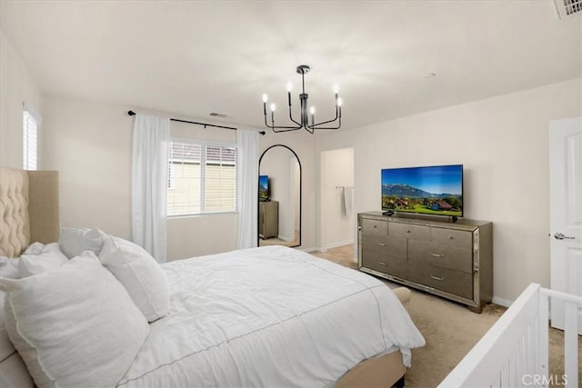 bedroom featuring a notable chandelier, visible vents, light colored carpet, and baseboards