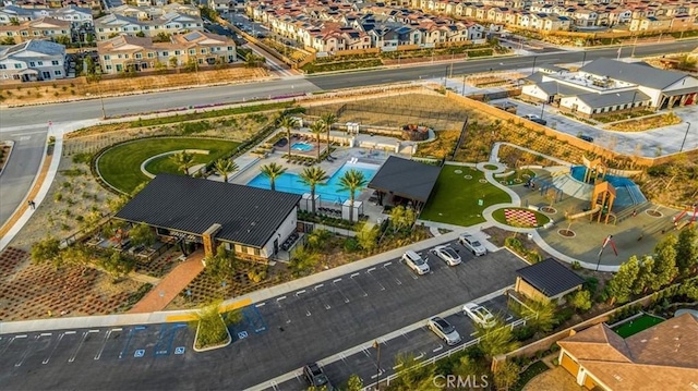 birds eye view of property with a residential view