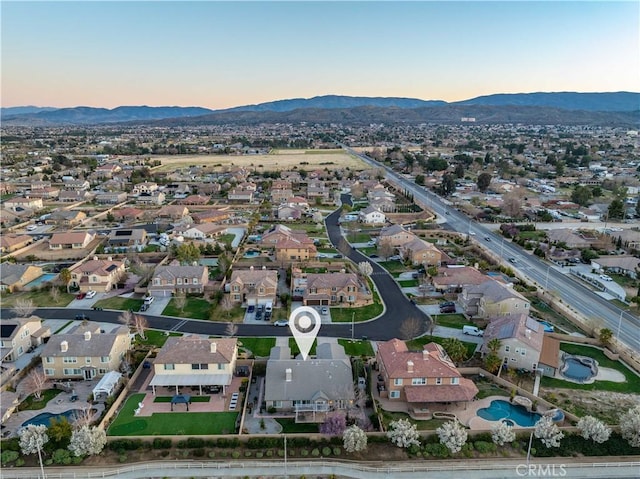 birds eye view of property featuring a residential view and a mountain view