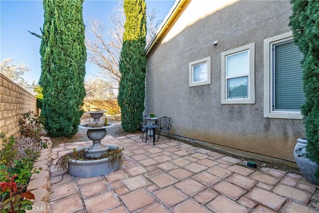 view of patio / terrace with fence