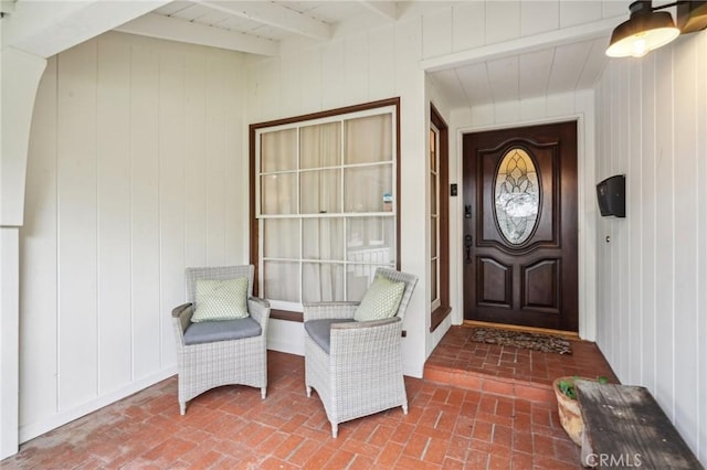 property entrance with ceiling fan