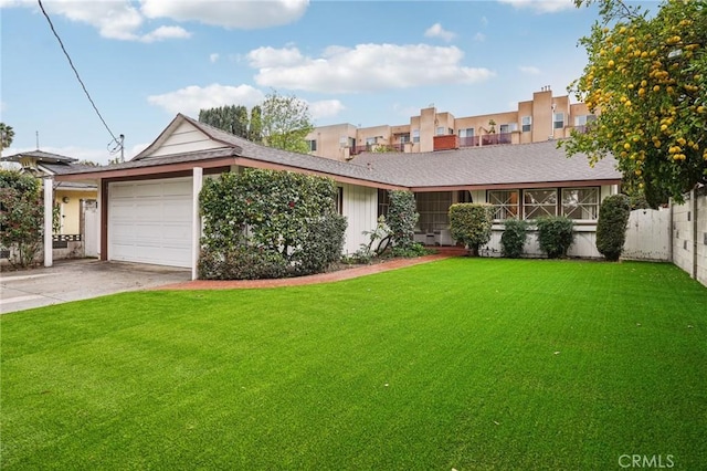 ranch-style home with a front lawn, a garage, a shingled roof, driveway, and fence